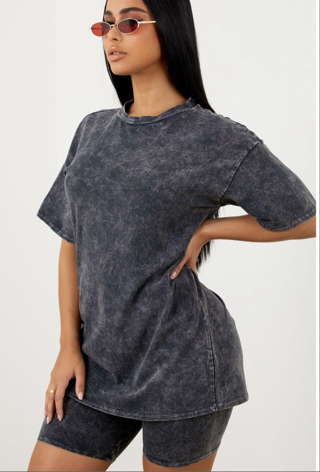 "Be the Designer" Acid Wash Oversized Tshirt in Black, side view.